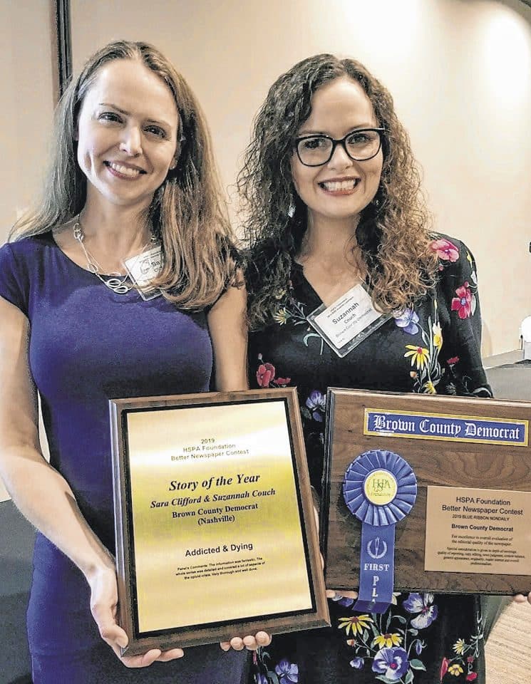 Editor Sara Clifford and reporter-photographer Suzannah Couch pose with the Story of the Year and Nondaily Blue Ribbon plaques they picked up at the Hoosier State Press Association Better Newspaper Contest Saturday in Greenwood. David Wood | Submitted