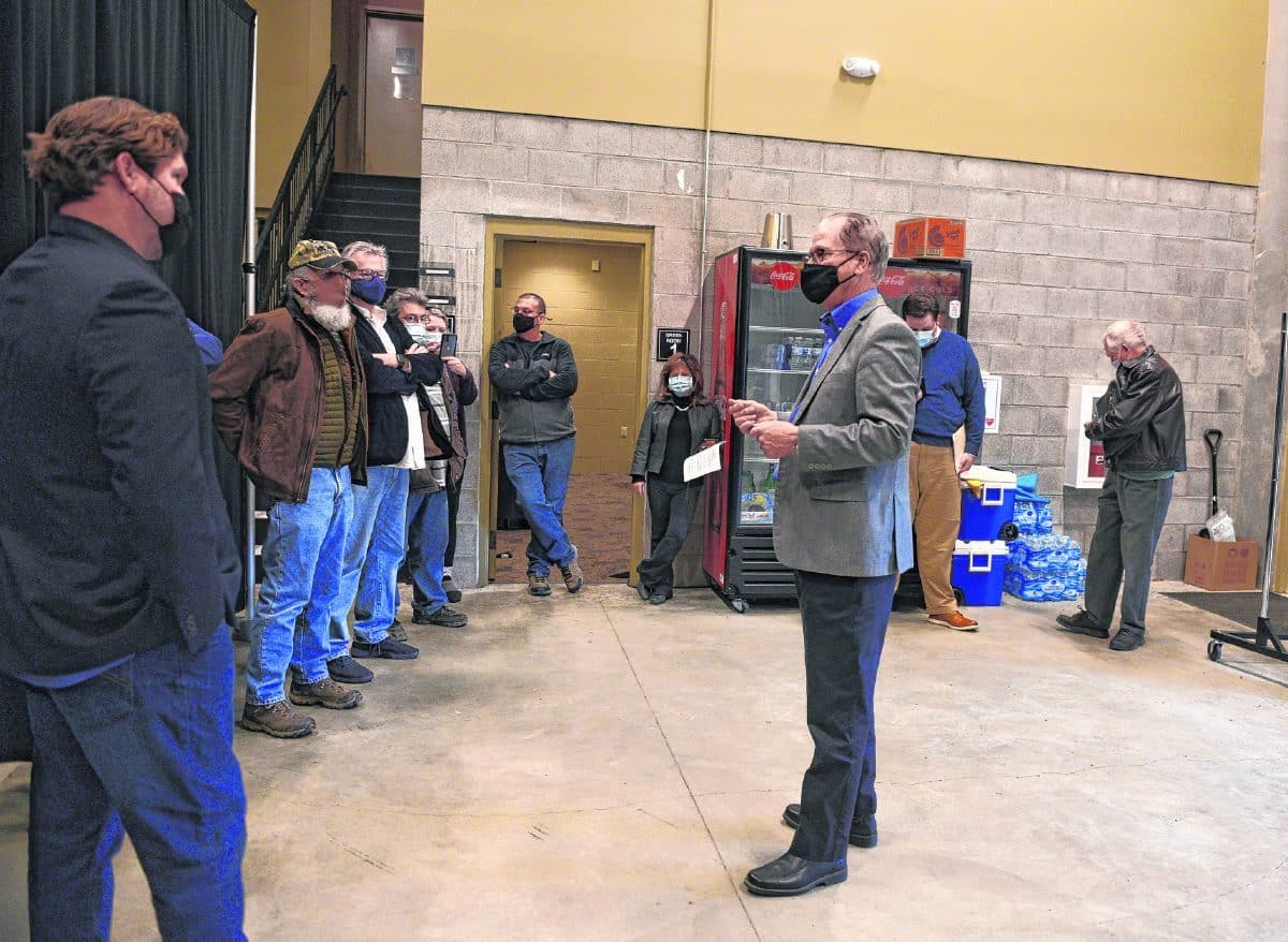 U.S. Sen. Mike Braun speaks to members of the Brown County Music Center management group and staff backstage on April 1. Braun visited the music center to learn about the success of the venue before COVID-19 forced it to close its doors, how the venue then pivoted to adapt to the pandemic, and what is in store for the future of the music center, which is eyeing a return of shows by the end of the third quarter this year. Suzannah Couch | The Democrat