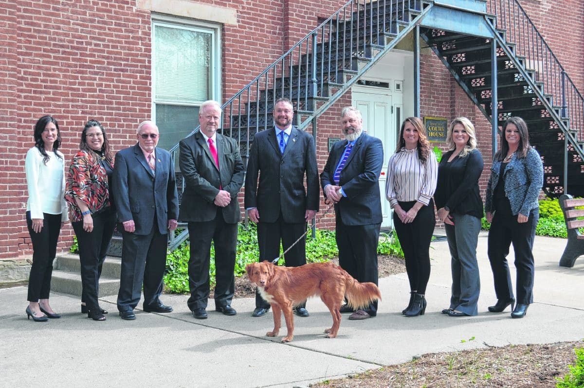 Left to right: Traffic Deferral and Diversion Coordinator Mandy Parman, Victim Advocate Jill Wunder, investigator Bill Hamilton, Chief Deputy Prosecutor Rob Seet, Prosecutor Ted Adams, Child Support Prosecutor Brent Cullers, legal secretary Stacey Price, Child Support Administrator Jerrica Shrader, legal assistant Leigh Ann Pittman and Griff the dog.  Submitted photo