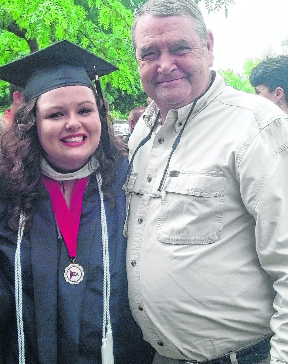 Reporter-photographer Suzannah Couch poses for a photo with her Papa, Russell Kelso, after graduating from Franklin College in 2013. He was her biggest fan, always there for the big moments with that proud smile on his face. Kelso was a lifetime resident of Brown County. He passed away in February. Submitted