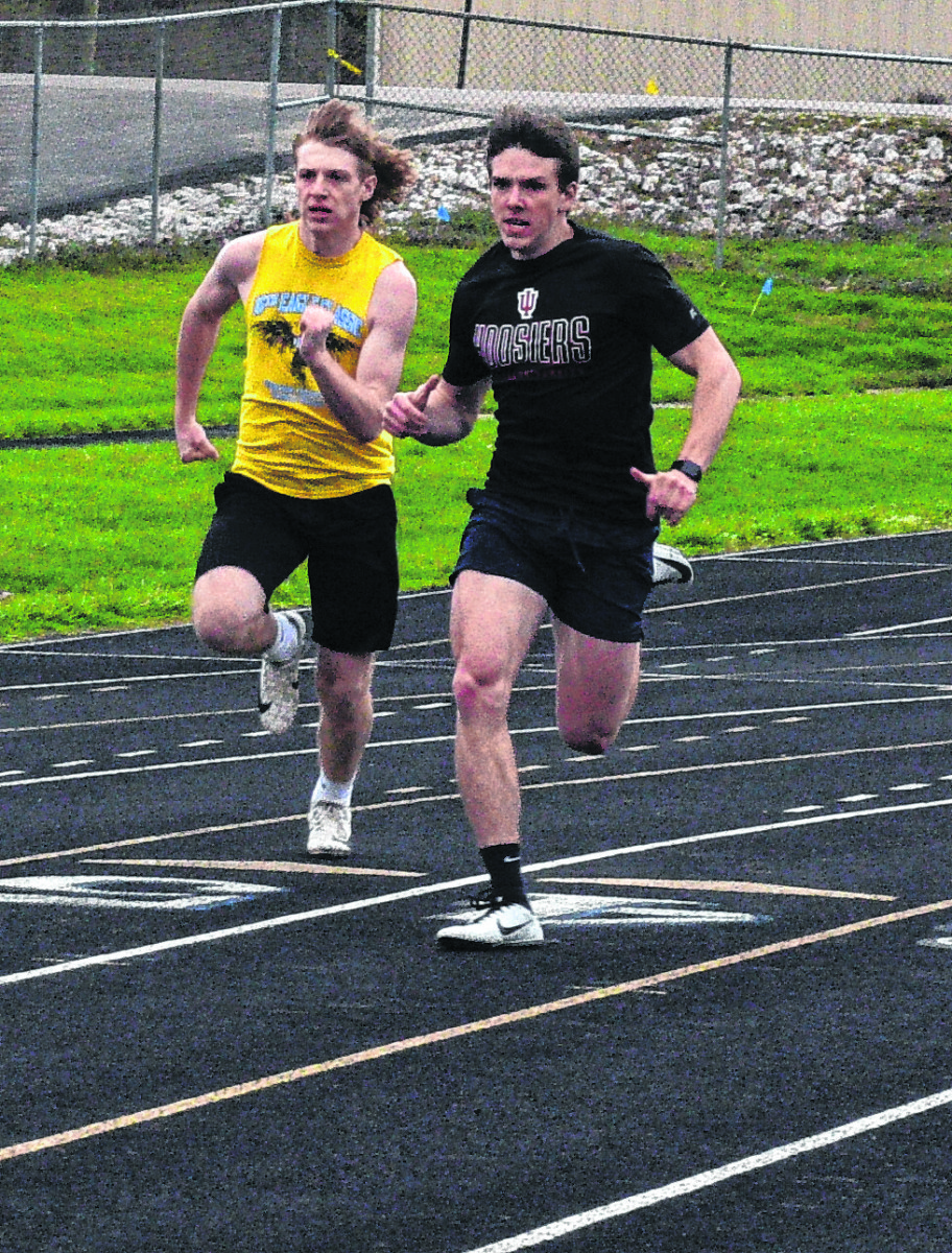 Ethan Spiece and Cameron Fox train on the Brown County High School track on March 26. | Kevin Roush