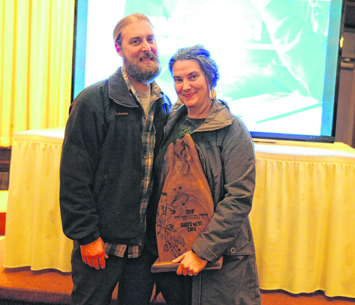 Lance and Tyra Miller pose for a photo after their restaurant the Bird’s Nest Café won the Brown County Beautification award for landscape design at the Brown County Chamber of Commerce annual meeting Jan. 31, 2019. | Brown County Democrat file photo