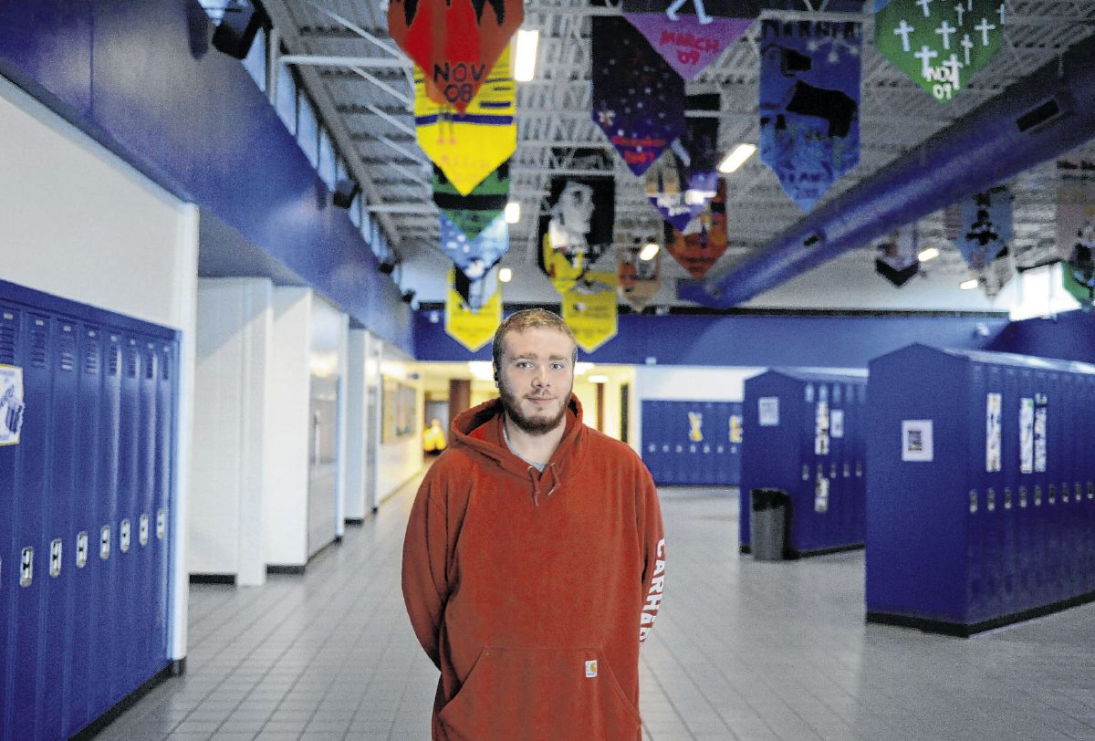 Brown County High School senior Cooper Olmsted poses for a photo in the common area in the high school. Olmsted recently spoke to health classes about the dangers of vaping and how vaping made him sick, causing him lung damage. Olmsted no longer vapes and hopes that sharing his story with his classmates will help others quit vaping before they get sick. Suzannah Couch | The Democrat