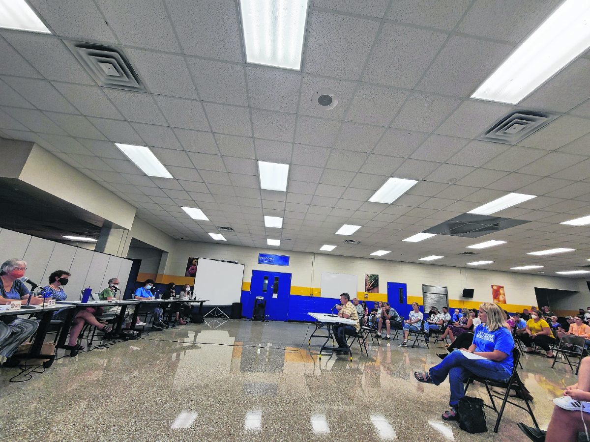 Daniel Smith shares his comments about changes to the Brown County Schools COVID-19 educational service delivery plan during a special meeting of the Brown County Schools Board of Trustees on Aug. 12 at the high school. Around 60 parents, guardians and school employees showed up to express their concern or support over a proposed change to the district’s plan that would require all students and staff to mask up regardless of vaccination status. After an hour of comments from the public, the board voted unanimously to approve the changes. Suzannah Couch | The Democrat